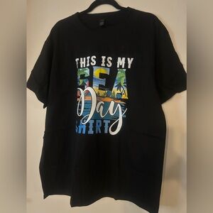 NWOT Black Graphic Tee with Sea Day Print